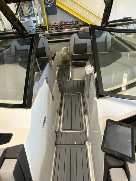 Slide: The Image of 2025 Cobalt R35 boat interior with sleek seating and modern design. - 15