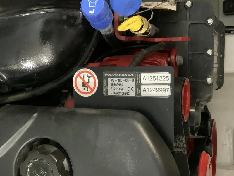 Slide: The Image of Close-up of a Volvo Penta engine in a 2025 Cobalt R35 boat. - 17