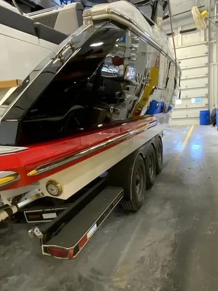 Slide: The Image of 2025 Cobalt R35 boat on trailer in a garage setting. - 3