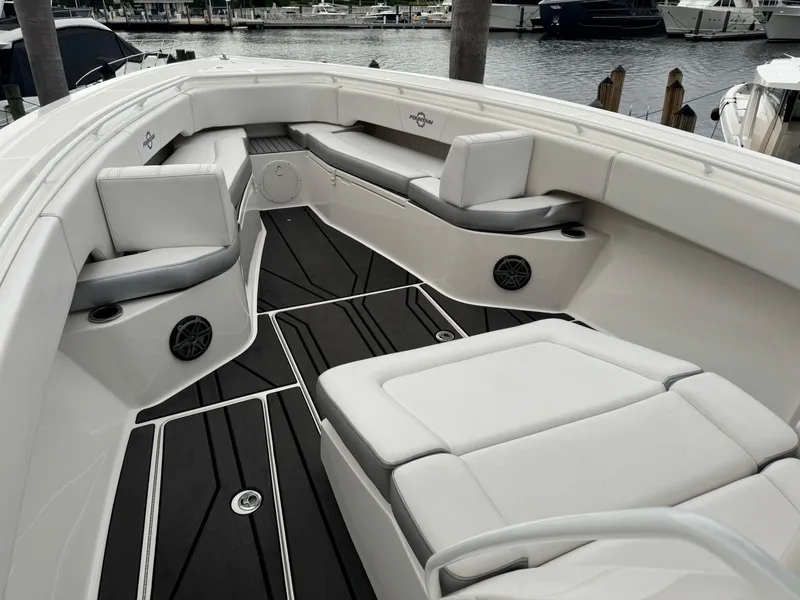 Slide: The Image of 2019 Fountain 38 CC boat interior with sleek seating and modern design. - 10