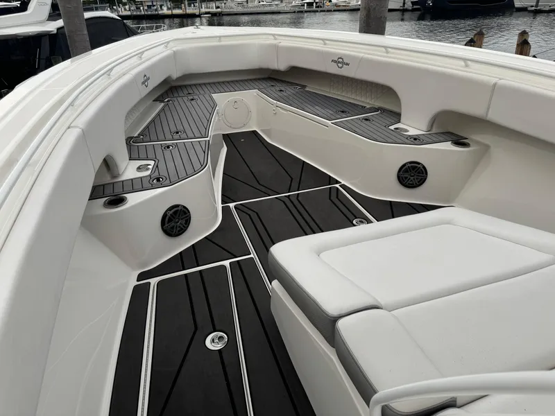 Slide: The Image of 2019 Fountain 38 CC boat interior with sleek seating and modern design. - 11