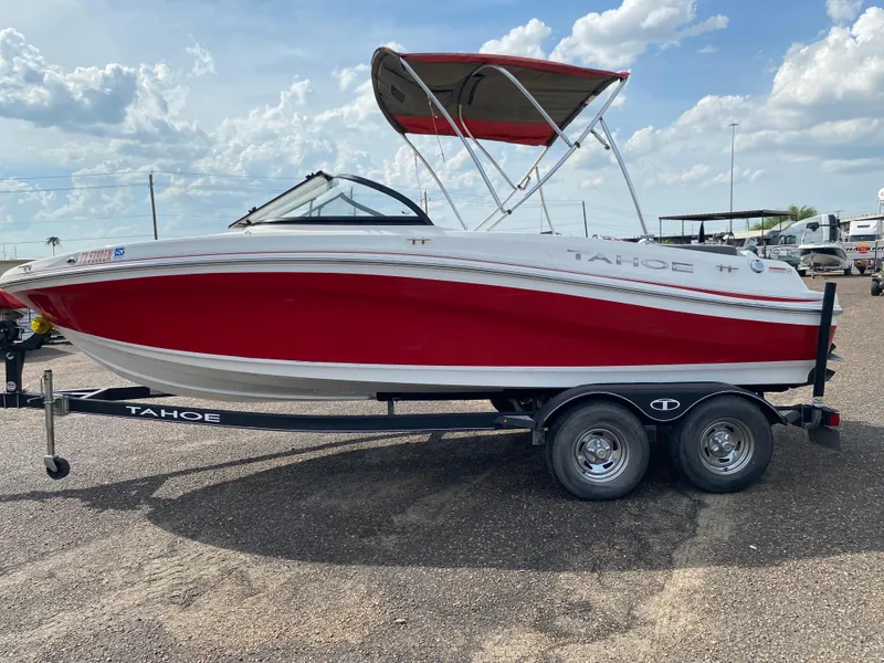 Slide: The Image of 2019 Tahoe 500 TS boat with red and white design on a trailer. - 3