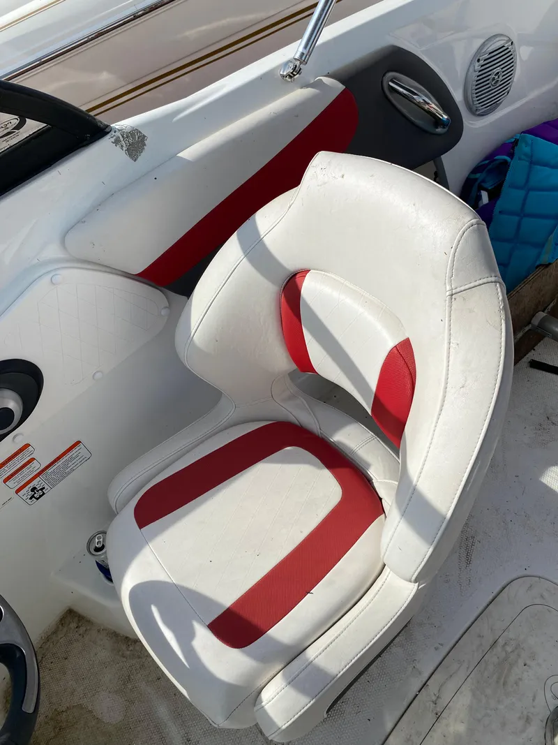 Slide: The Image of White and red boat seat in a 2019 Tahoe 500 TS. - 9