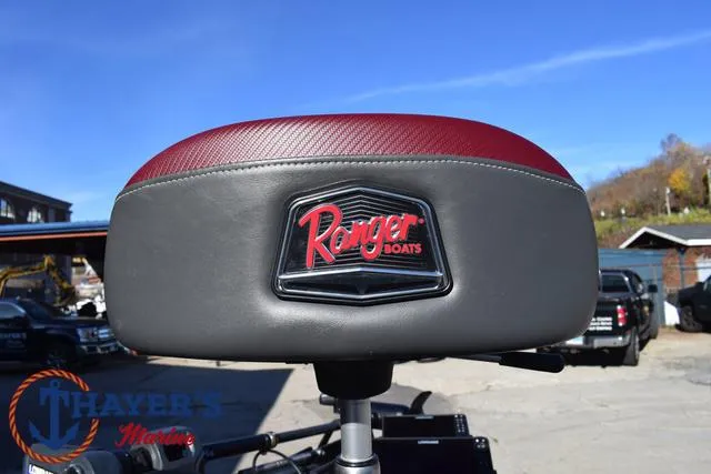 Slide: The Image of Ranger Z520L 2021 boat seat with logo, outdoor setting, clear sky. - 13