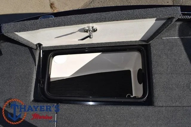 Slide: The Image of Open storage compartment on 2021 Ranger Z520L boat deck. - 16