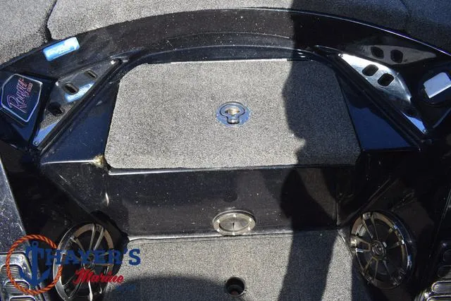 Slide: The Image of 2021 Ranger Z520L boat deck with storage compartment and speakers. - 19