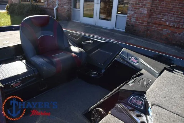 Slide: The Image of 2021 Ranger Z520L boat interior with seating and control panel. - 22