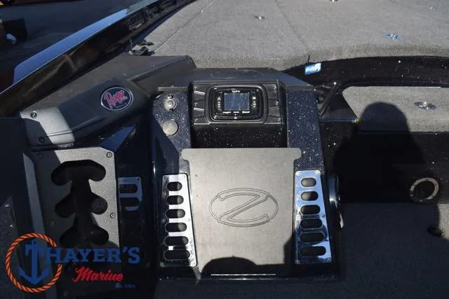 Slide: The Image of 2021 Ranger Z520L boat dashboard with control panel and logo. - 24