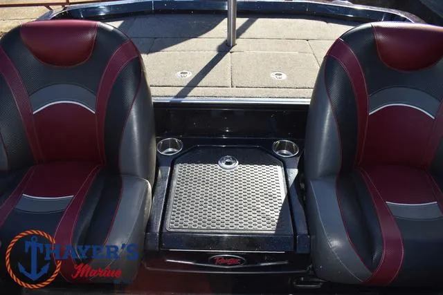 Slide: The Image of 2021 Ranger Z520L boat interior with dual seats and Thayer's Marine logo. - 25