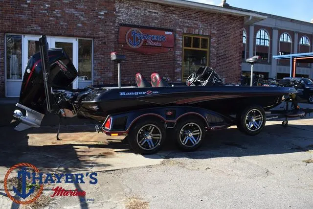 Slide: The Image of 2021 Ranger Z520L boat at Thayer's Marine dealership, side view. - 3