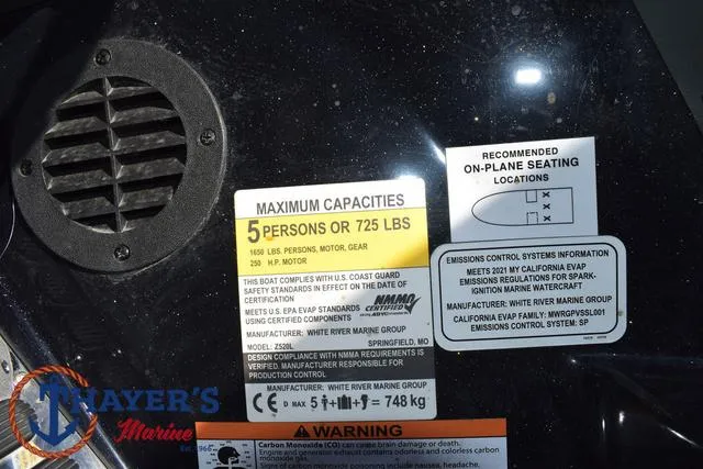 Slide: The Image of Ranger Z520L 2021 boat capacity and safety labels, seating recommendations, and emissions information. - 33