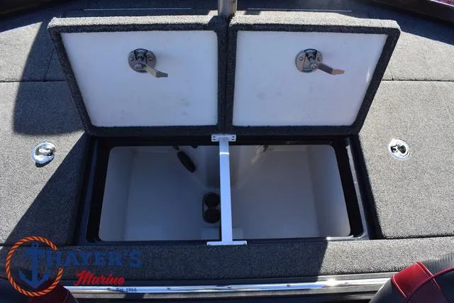Slide: The Image of 2021 Ranger Z520L boat storage compartments open, showcasing spacious interior. - 38