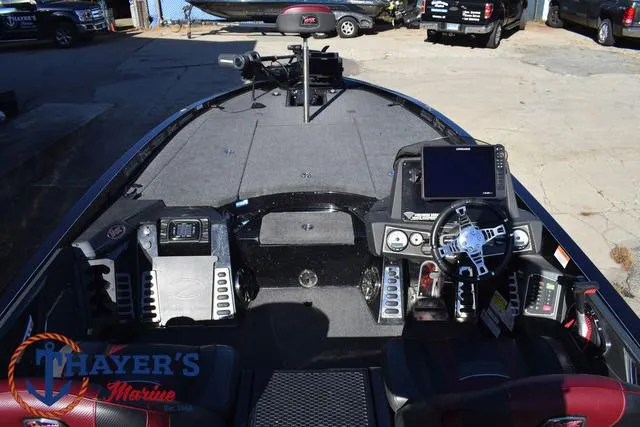 Slide: The Image of 2021 Ranger Z520L boat interior with advanced dashboard and steering controls. - 40