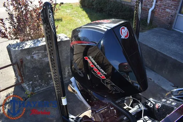 Slide: The Image of 2021 Ranger Z520L boat with a powerful black engine and dual Power-Pole anchors. - 43