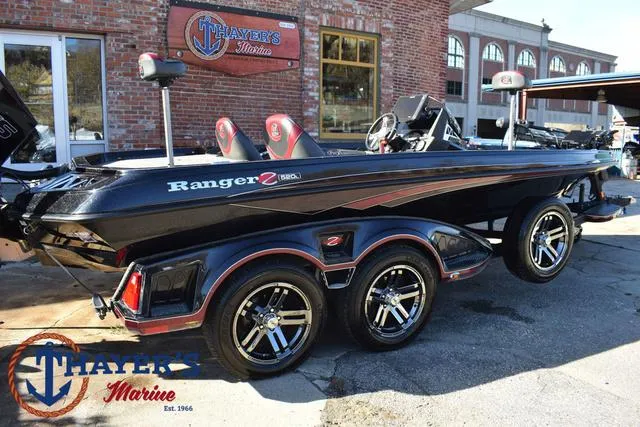 Slide: The Image of 2021 Ranger Z520L boat at Thayer's Marine dealership. - 47