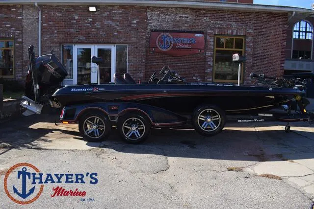 Slide: The Image of 2021 Ranger Z520L boat at Thayer's Marine dealership. - 49