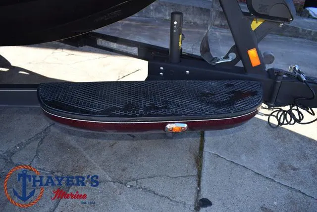 Slide: The Image of Ranger Z520L 2021 boat trailer step with Thayer's Marine logo. - 8