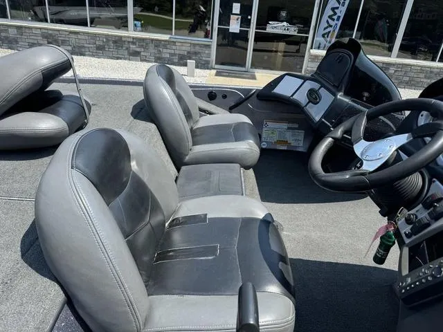 Slide: The Image of 2011 Skeeter ZX 190 boat interior with dual seats and steering console. - 5