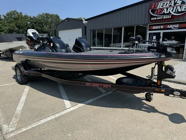 Slide: The Image of 2011 Skeeter ZX 190 boat parked outside dealership. - 8