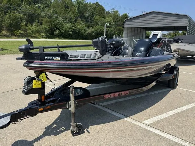 Slide: The Image of 2011 Skeeter ZX 190 fishing boat on trailer in parking lot. - 9