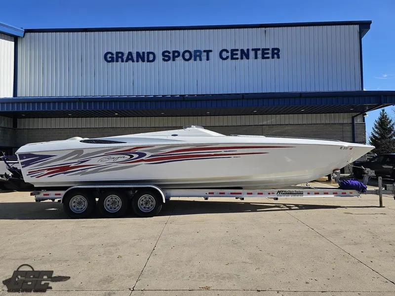 Slide: The Image of 2004 Baja 33 Outlaw boat on trailer at Grand Sport Center. - 1