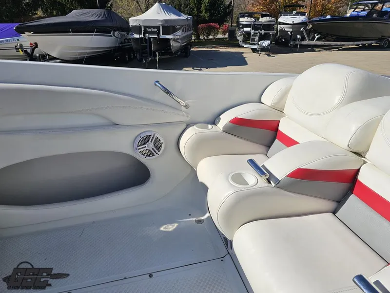 Slide: The Image of 2004 Baja 33 Outlaw boat interior with white and red seating. - 41