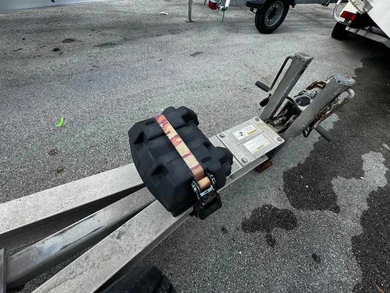 Slide: The Image of 2016 REAL X Model R32X trailer hitch with secured black cargo box. - 10