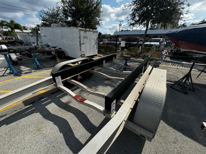 Slide: The Image of 2016 REAL X Model R32X trailer in parking lot, sunny day. - 18