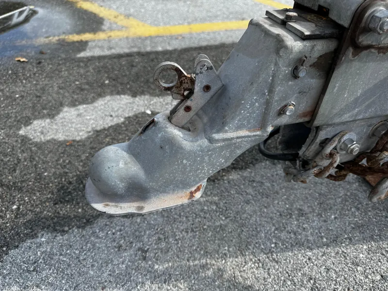 Slide: The Image of Close-up of a 2016 REAL X Model R32X trailer hitch on asphalt. - 26