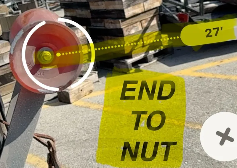 Slide: The Image of Close-up of a 2016 REAL X Model R32X trailer part with measurement overlay. - 32