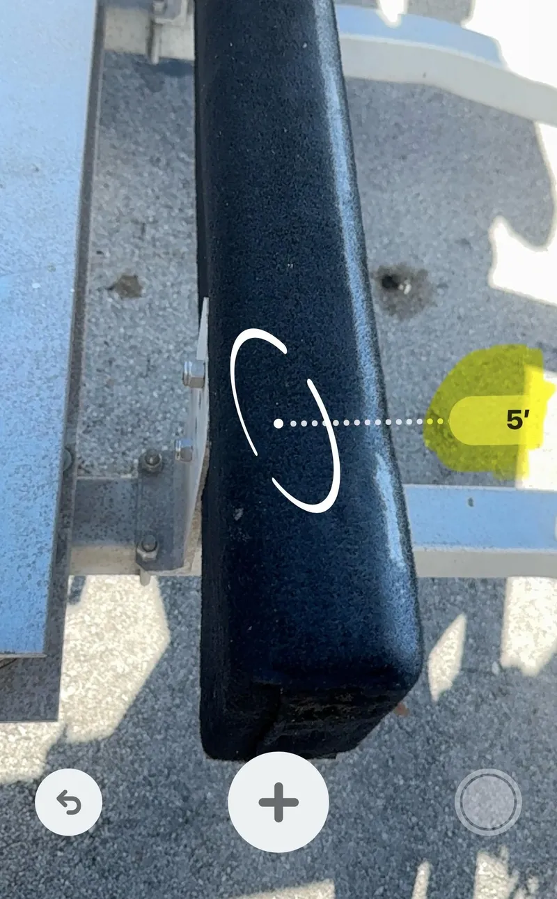 Slide: The Image of Close-up of a 2016 REAL X Model R32X trailer component with measurement overlay. - 35
