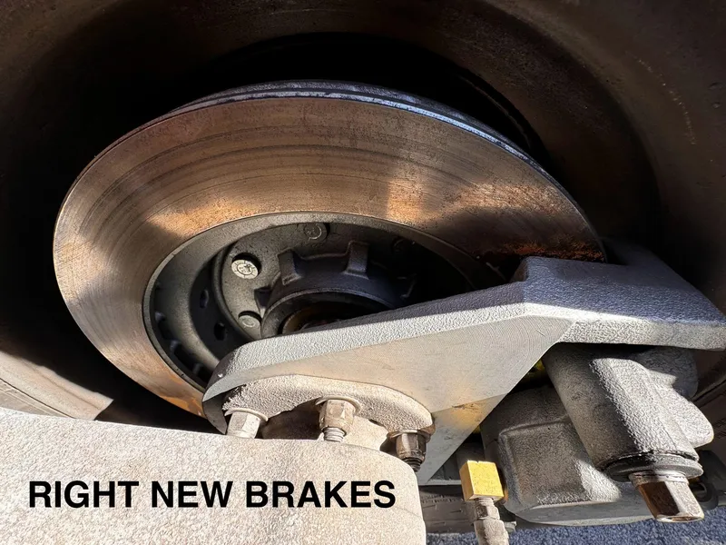Slide: The Image of Close-up of new right brake on 2016 REAL X Model R32X trailer. - 40