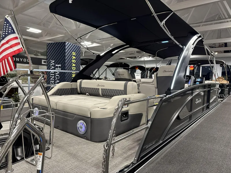 Slide: The Image of 2025 Barletta Lusso L25-UCA luxury pontoon boat with elegant seating and sleek design. - 4