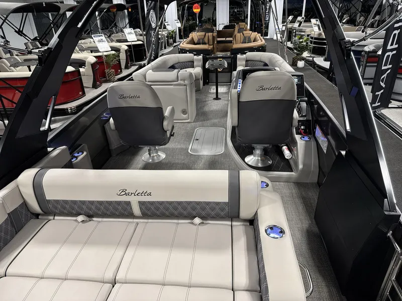 Slide: The Image of 2025 Barletta Lusso L25-UCA luxury pontoon boat interior with plush seating. - 5
