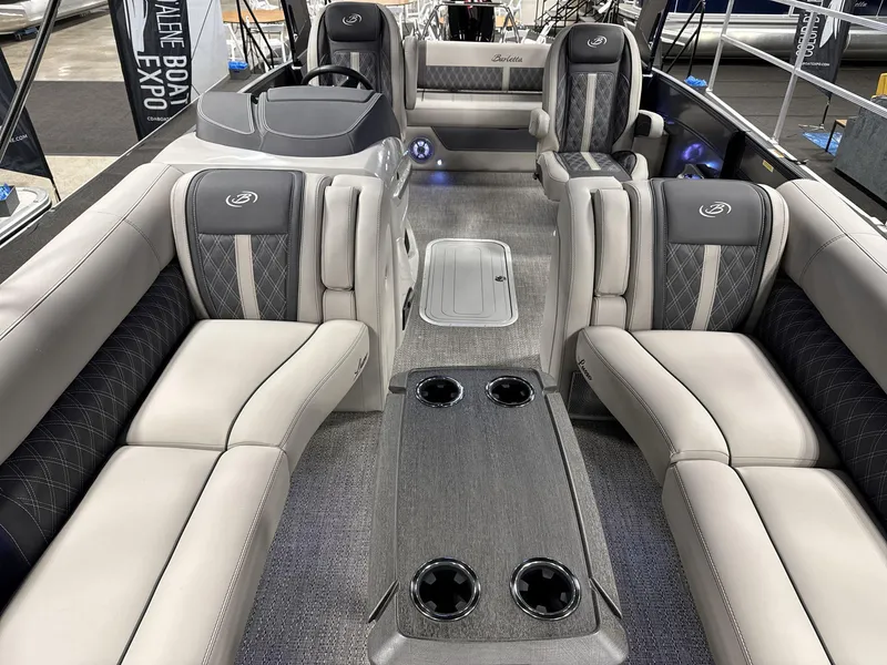 Slide: The Image of 2025 Barletta Lusso L25-UCA luxury boat interior with plush seating and modern design. - 7