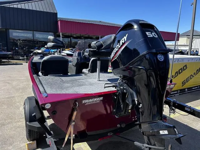 Slide: The Image of 2021 Tracker BASS TRACKER® Classic XL boat dashboard with steering wheel and gauge. - 3