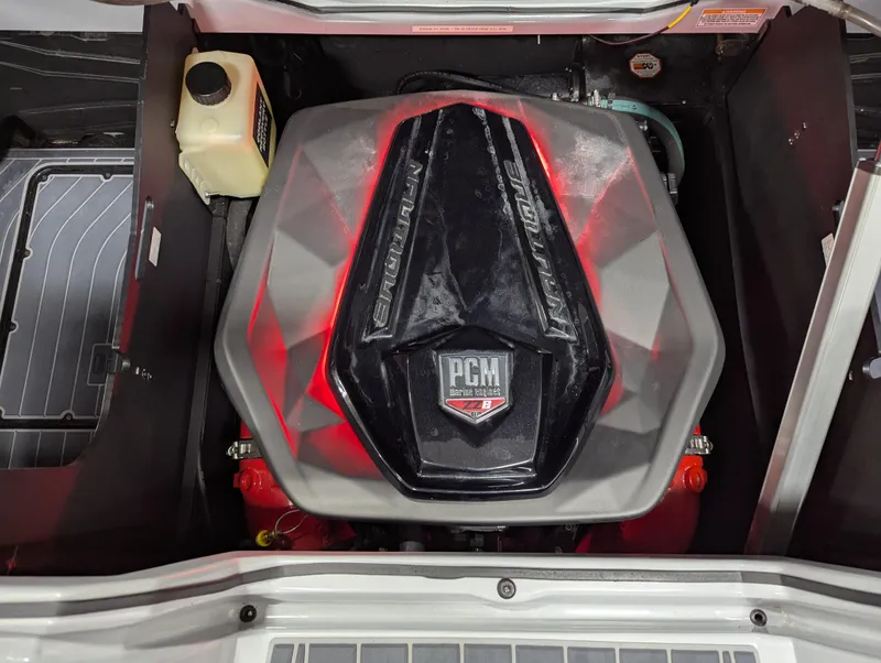 Slide: The Image of Engine compartment of a 2020 Nautique G23 Paragon boat with PCM engine. - 43