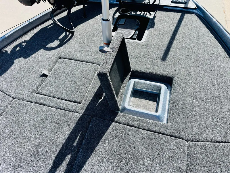 Slide: The Image of 2025 Nitro Z21 XL Pro boat deck with storage compartments and textured surface. - 16