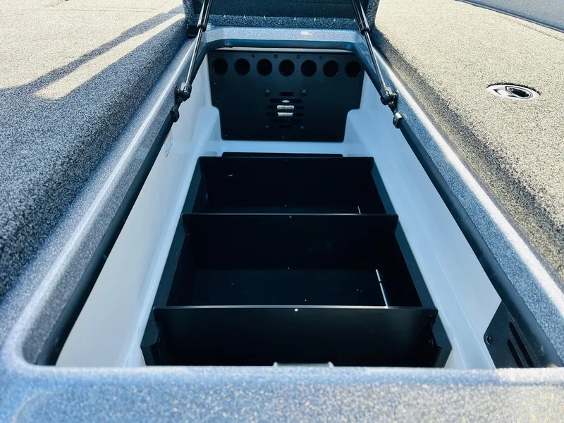 Slide: The Image of Open storage compartment of 2025 Nitro Z21 XL Pro boat. - 25