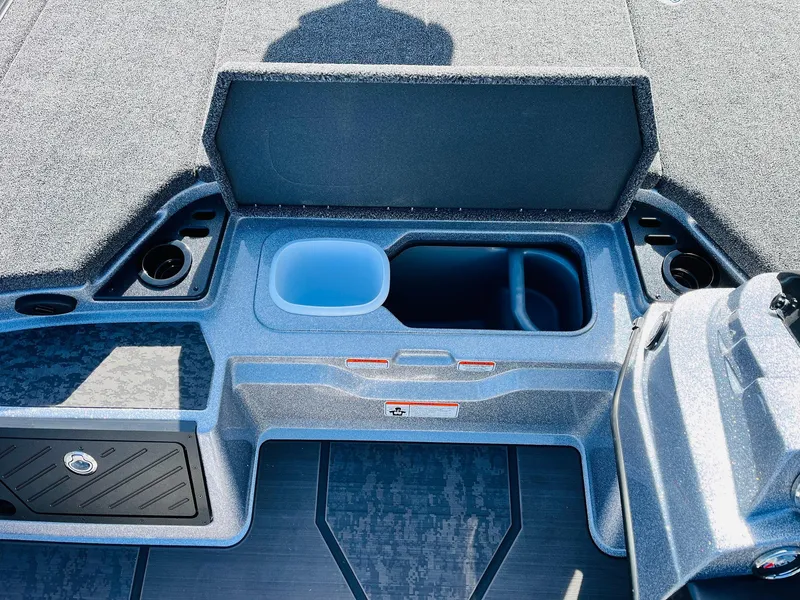 Slide: The Image of 2025 Nitro Z21 XL Pro boat storage compartment with cup holders and organizer. - 32