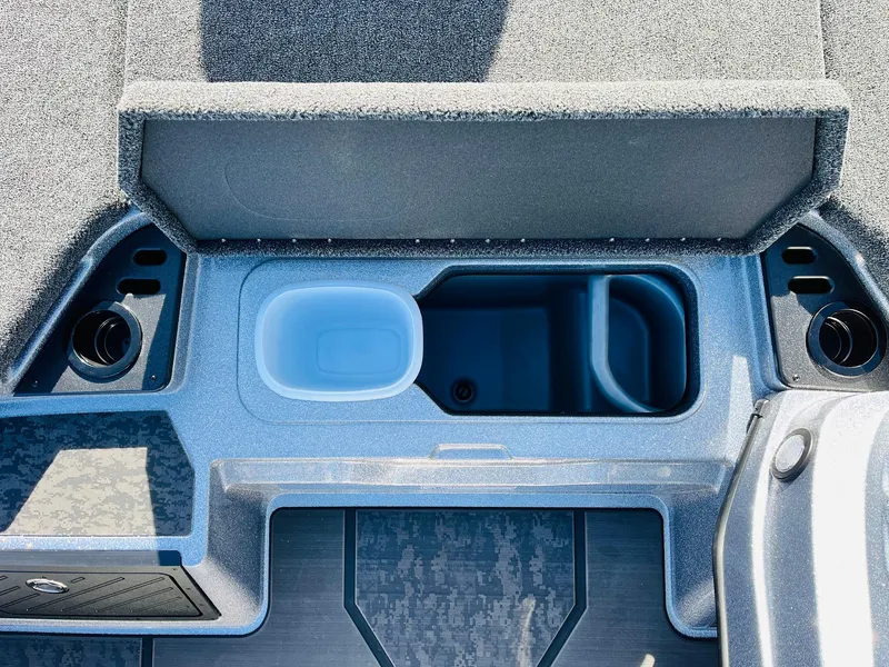 Slide: The Image of 2025 Nitro Z21 XL Pro boat storage compartments and cup holders. - 33