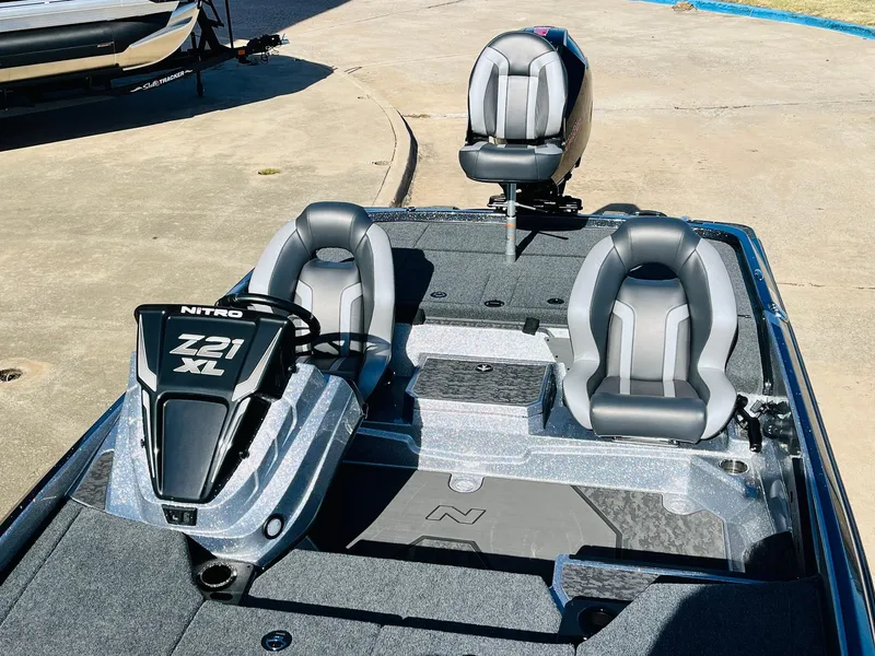 Slide: The Image of 2025 Nitro Z21 XL Pro boat interior with sleek seating and modern design. - 34