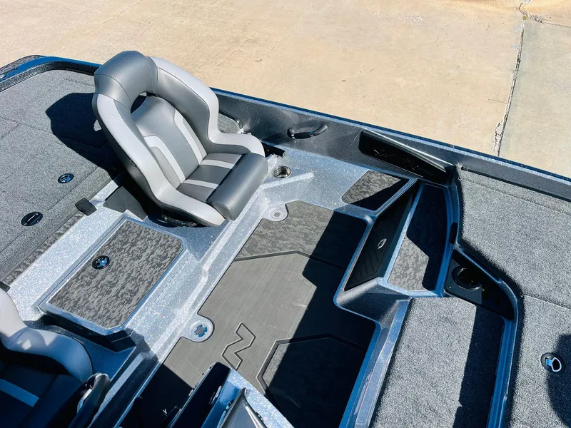 Slide: The Image of 2025 Nitro Z21 XL Pro boat interior with sleek seating and storage compartments. - 35
