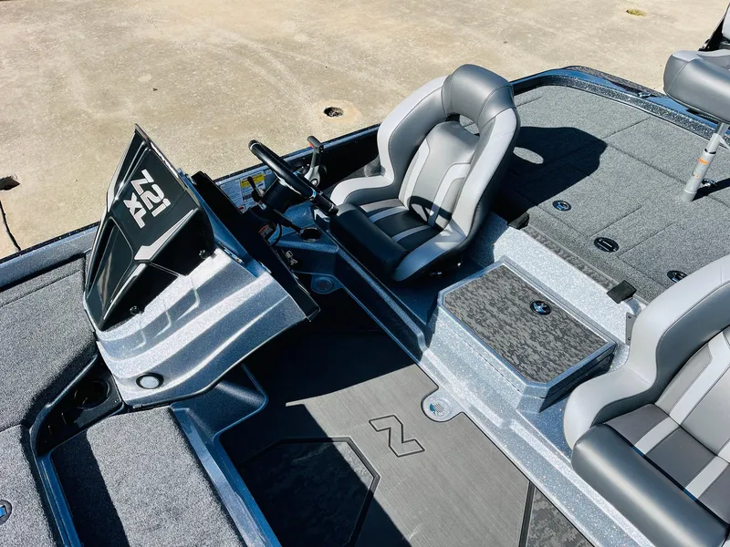 Slide: The Image of 2025 Nitro Z21 XL Pro boat interior with sleek seating and modern dashboard. - 36