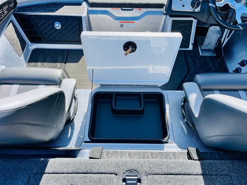Slide: The Image of 2025 Nitro Z21 XL Pro boat interior with storage compartment and seating. - 37
