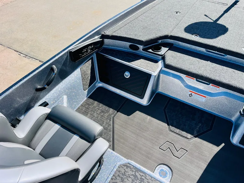 Slide: The Image of 2025 Nitro Z21 XL Pro boat interior with sleek seating and modern dashboard design. - 38