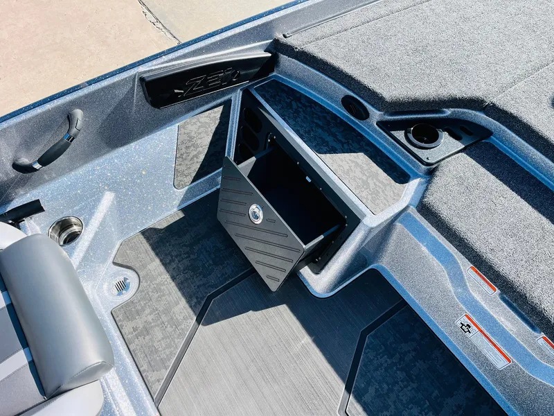 Slide: The Image of 2025 Nitro Z21 XL Pro boat interior with storage compartment and seating. - 39