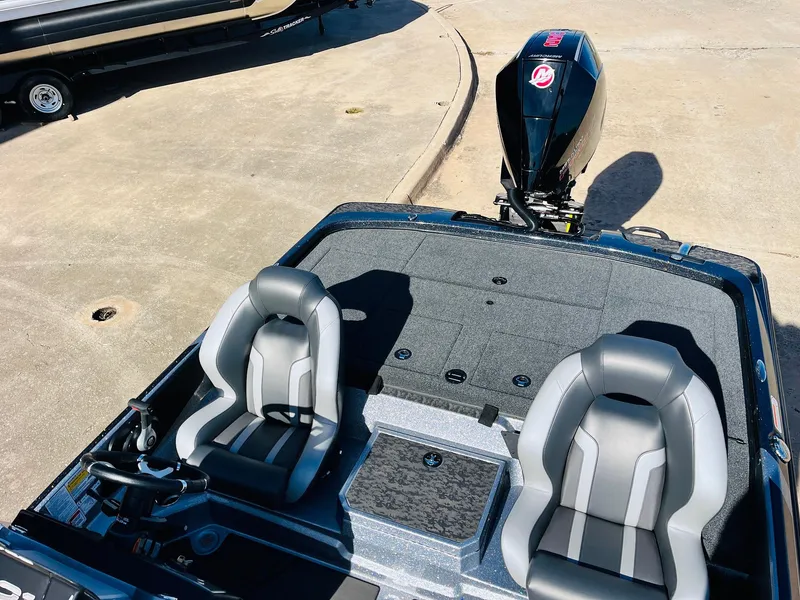 Slide: The Image of 2025 Nitro Z21 XL Pro boat with dual seats and powerful outboard motor. - 43