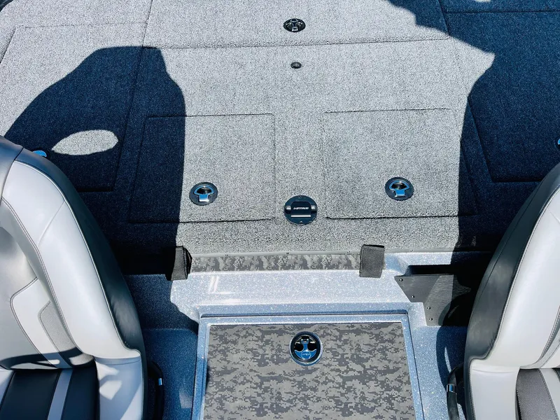 Slide: The Image of 2025 Nitro Z21 XL Pro boat interior with gray seating and storage compartments. - 44