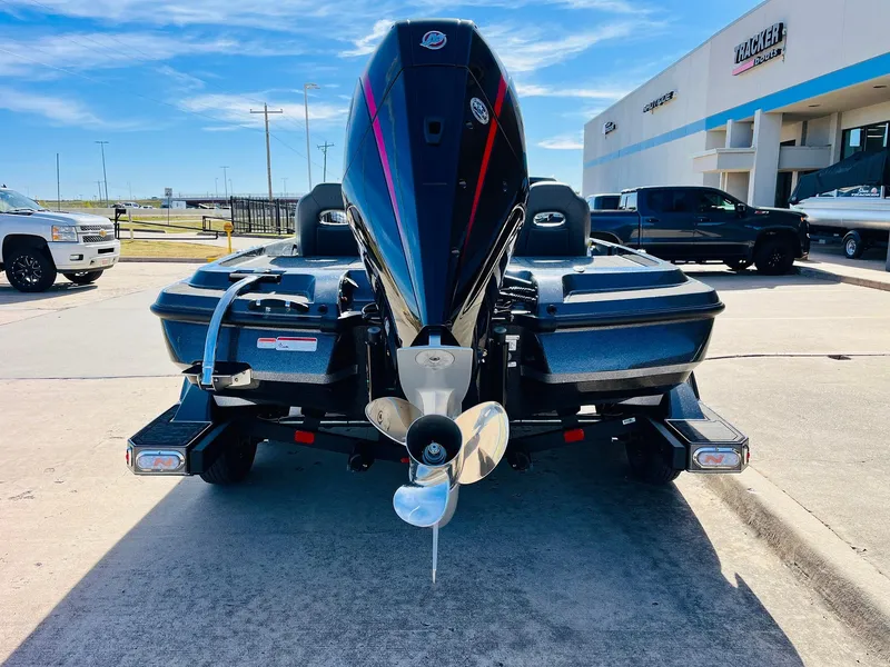 Slide: The Image of 2025 Nitro Z21 XL Pro boat on trailer, rear view in dealership lot. - 6